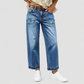Vintage jeans för damer i stretchtyg med raka ben, slitna påsydda fickor och fransiga, obearbetade benslut